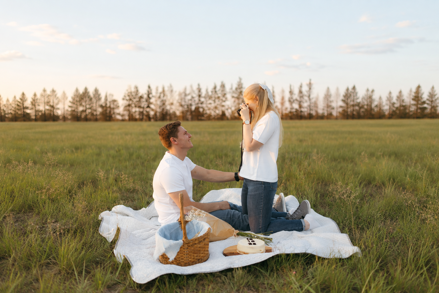 Family picnic photograph with an expanded landscape background